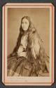 [Woman with long hair]