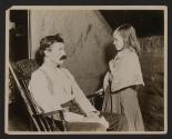 [Sick father with daughter in a tenement, New York]