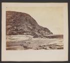 [Rocky cliffs and coastline]