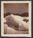 [Ice and distant coastline]