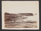 [Wooden building along rocky coastline, Battle Harbour, Labrador]