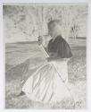 [Woman cleaning a woodwind instrument]