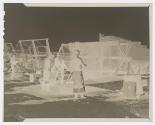 [Men mending fishing nets]