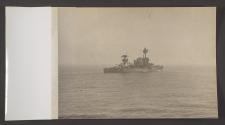 [New York class battleship escorting transport ships as part of convoy]