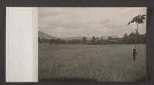 [Soccer/rugby pitch, near hills]