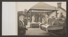 [Bren Gun Carriers of the 59th (Staffordshire) Infantry Division parade past King George VI, Queen Elizabeth and British Army officers]