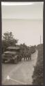 [Bren Gun Carriers and a truck from the 59th (Staffordshire) Infantry Division lined up for review parade]