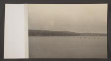 [Anti-submarine nets at a harbor mouth]