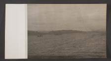 [Transport ships near coastline]