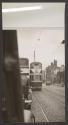 [Double decker streetcar on a Belfast street]