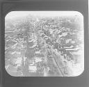 Peking. Streets with distance views of hill in Imperial Ground