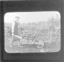 Man with Wheelbarrow working in Bog