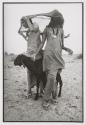 Kareemat and a cousin out grazing goats near their home, Barmer.