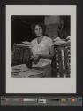 [Woman in flowered shirt, Buffalo China, Buffalo, New York]