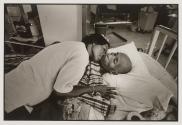 Lumpai Sirattanan, who is HIV+ holds her emaciated husband
