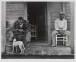 Two men on a front porch, West Palm Beach, Florida
