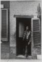 Man in a doorway, Baltimore