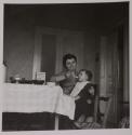 [Anna and Giuseppe Toscano, wife and child of the photographer, at their home in Rocella Jonica]