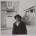[Ciccirro, town jester, in front of the Toscano home in Rocella Jonica]