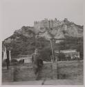 [Nando Frasca', friend of the photographer, in front of the Carafa Castle in Rocella Jonica]