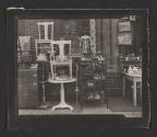 [Street display of furniture and shoes, Philadelphia]