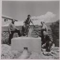 [Baronesa (right) with colleagues near a newly-installed aqueduct]