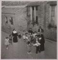 [Rosa Maria Toscano outdoors with nuns and other children]