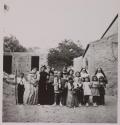 [Rosa Maria Toscano outdoors with nuns and other children]
