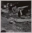 [Giuseppe Toscano, child of the photographer, playing near a creek]