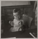 [Giuseppe Toscano, child of the photographer, wearing eyeglasses]