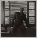 [Nicola Toscano sitting in a windowsill]