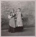 [Rosa Maria Toscano (left), child of the photographer, with a friend]