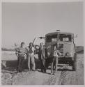 [Four unknown men]