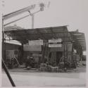 [DiLandro, Tommaso Toscano (second from left), at a machinery showroom]