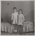 [Rosa Maria Toscano (right), child of the photographer, with a friend]