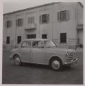 [Rosa Maria and Anna Toscano, child and wife of the photographer, in their family vehicle]