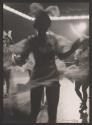 [Women dancing]