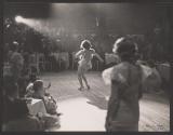 [A woman performing at a nightclub]