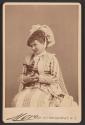 [Portrait of woman with dog]