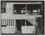 Clapboard House with Striped Shutters, West Palm Beach