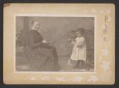 [Woman and child winding yarn]