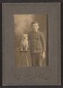 [Boy with dog]