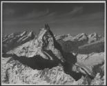 [Aerial view of the Swiss Alps]