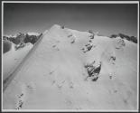 [Aerial view of the Swiss Alps]