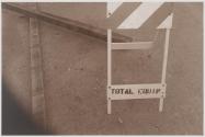 [Construction warning sign and lumber]