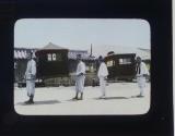 [Men carrying "Kamah"]