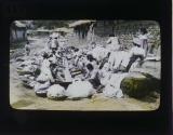 [Women washing clothes]