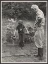 [Steichen and Jeanette Miller watering the garden, Umpawaug Farm]