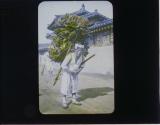 [Man carrying "Jipshin" shoes on "Jigae"]