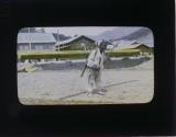 [Man carring wood beam on "Jigae"]